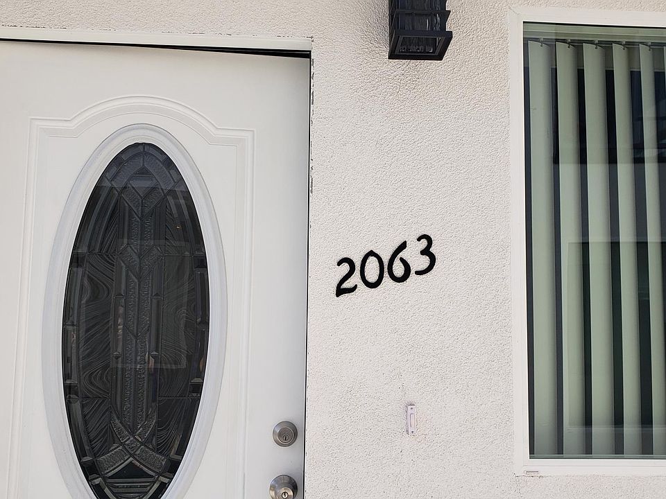 1st image of 2063 W Florence Ave Back 1