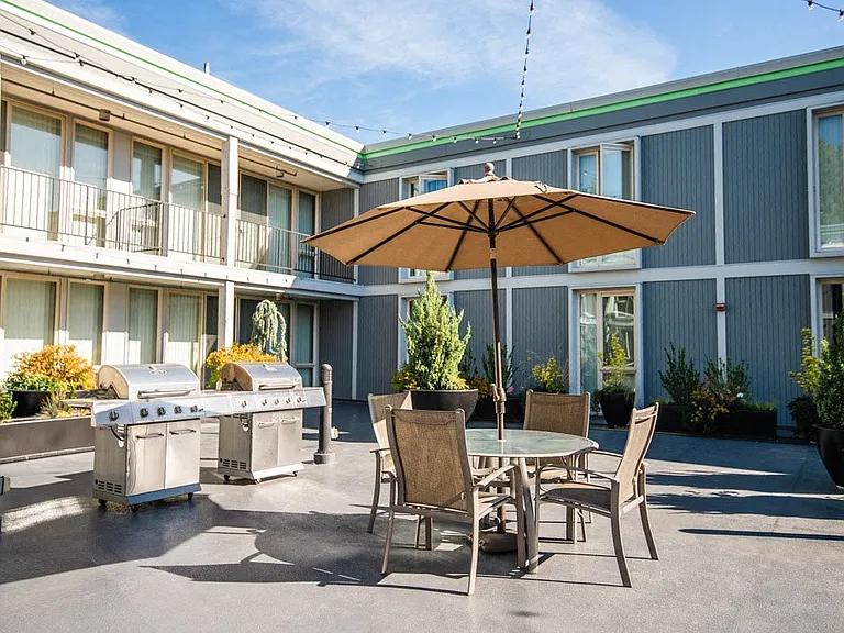 Seattle Apartments - Cosmopolitan Apartments - Common Patio and Gas Grills