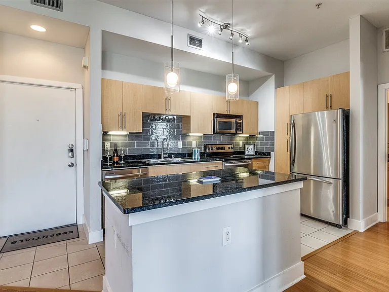 Open kitchen with island bar.