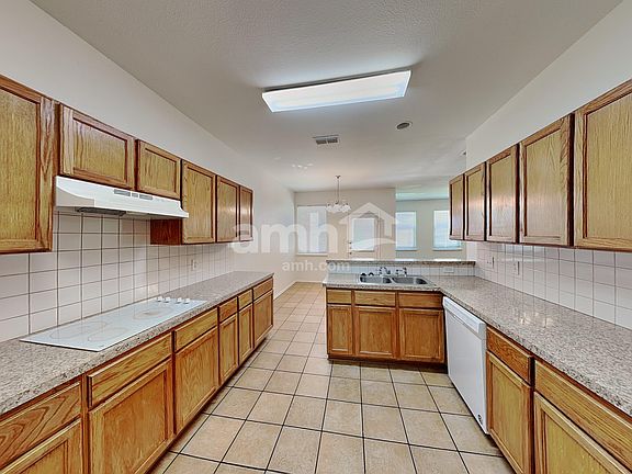 4th image of 8408 Rain Forest Ln