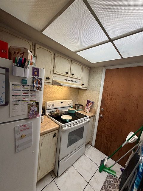 Kitchen Stove and Refrigerator.