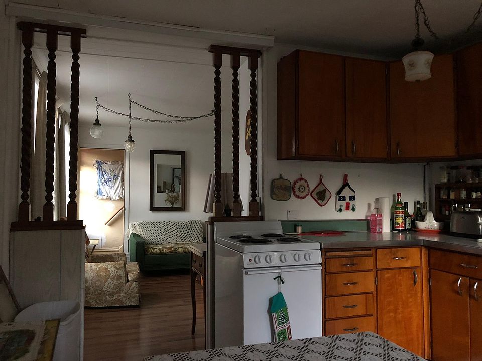 Kitchen looking into living room. Living