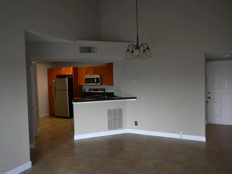 8721 Wiles Rd #305 — Photo 42