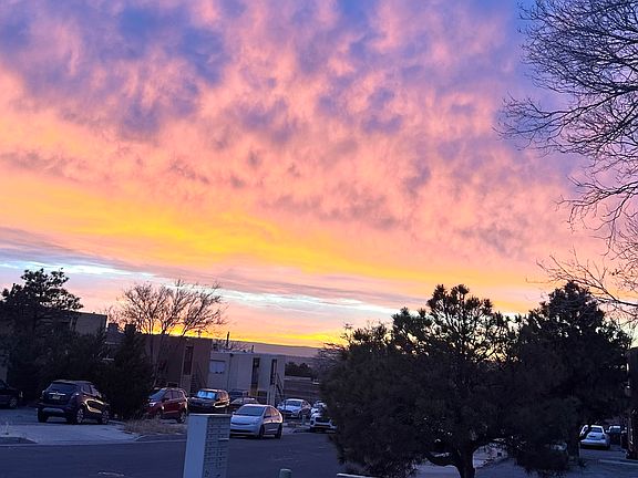 Apsrtment building looking west at sunset