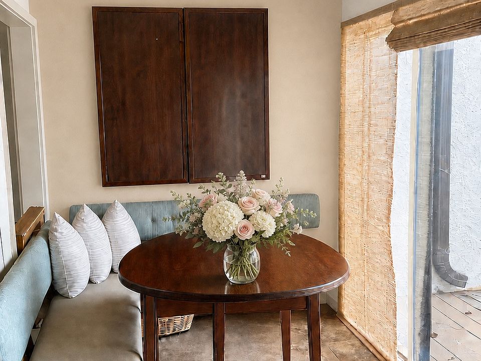 Breakfast nook/ office with a view of the back patio on the marina
