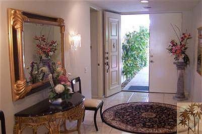 The front entry hall, offering a fine display of the warm el