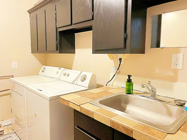Laundry room with washer and dryer