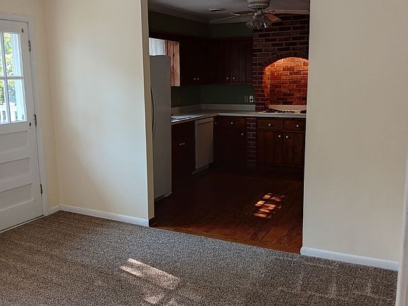 Dining space off kitchen with door to deck