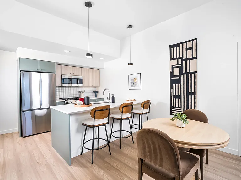 Bright, open kitchens at Modera Beaverton feature clean lines and generous islands_designed for everyday ease just minutes from Beaverton dining and transit.