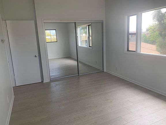 MAIN BEDROOM WITH DOUBLE CLOSET - WEST VIEW