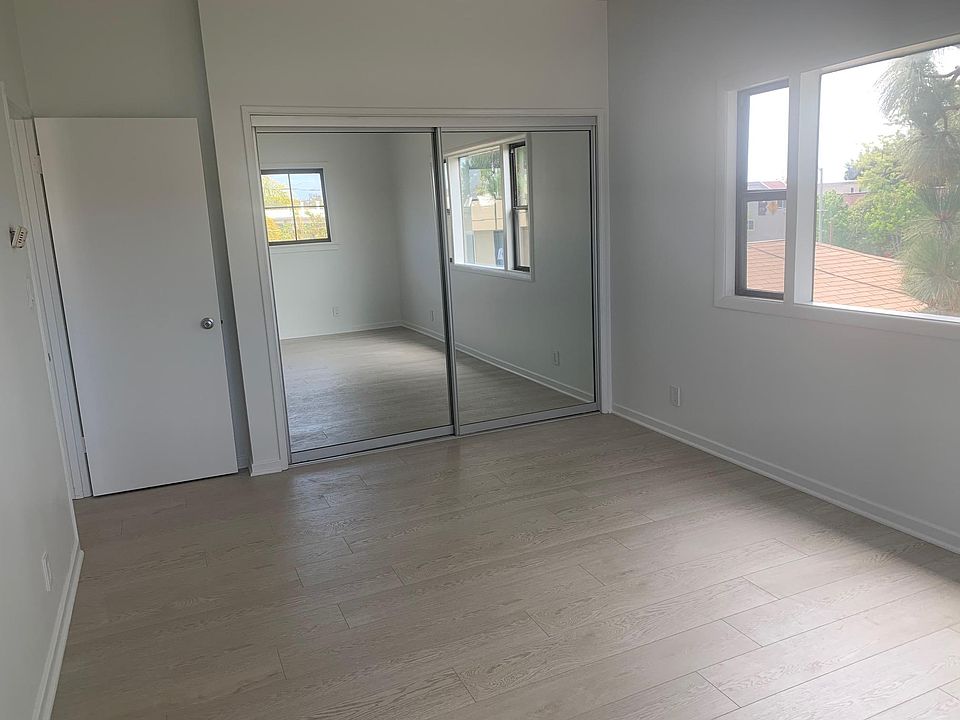 MAIN BEDROOM WITH DOUBLE CLOSET - WEST VIEW