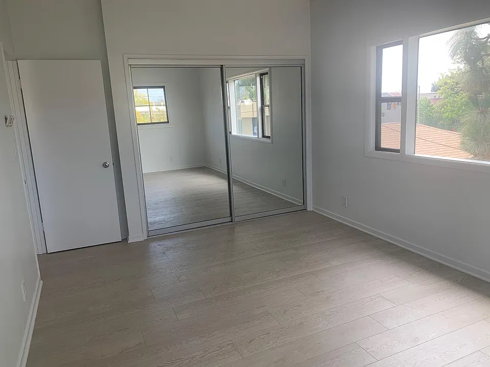 MAIN BEDROOM WITH DOUBLE CLOSET - WEST VIEW