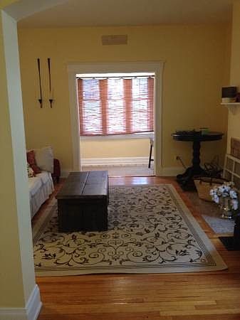 Livingroom view form dining room. Kitchen entrance to the le