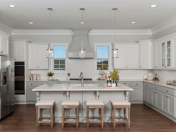 Gorgeous kitchen with large island and windows for a perfect open feel.