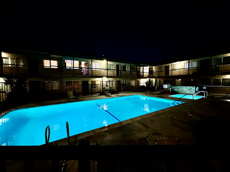 Tranquil swimming pool in the evening