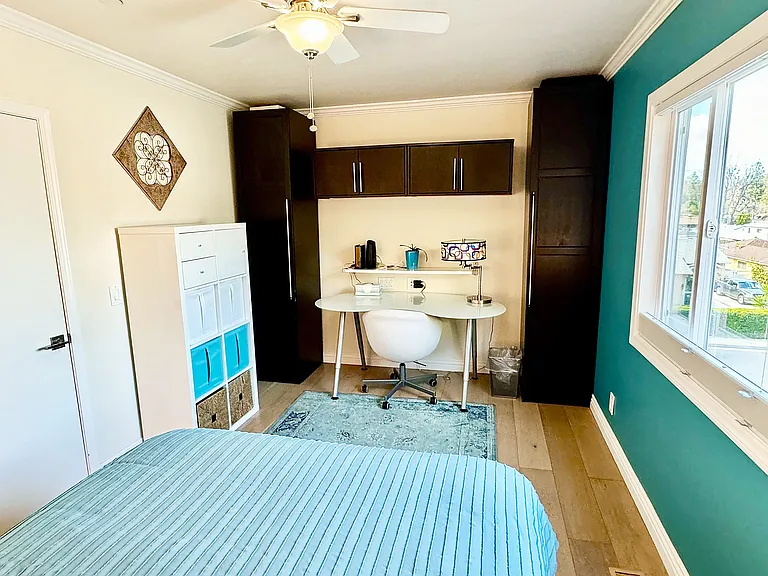 Upstairs bedroom with queen size new mattress, workspace drawer unit and wardrobe for hanging clothes