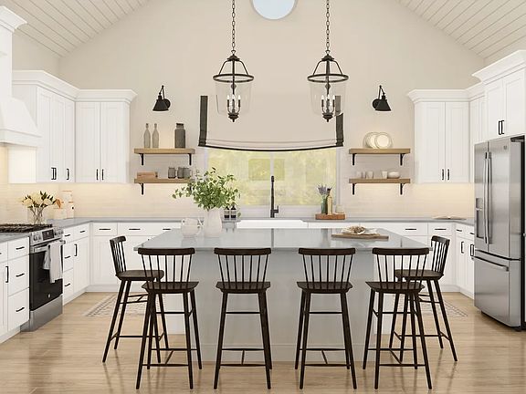 Kitchen with pendant lighting and vaulted ceiling