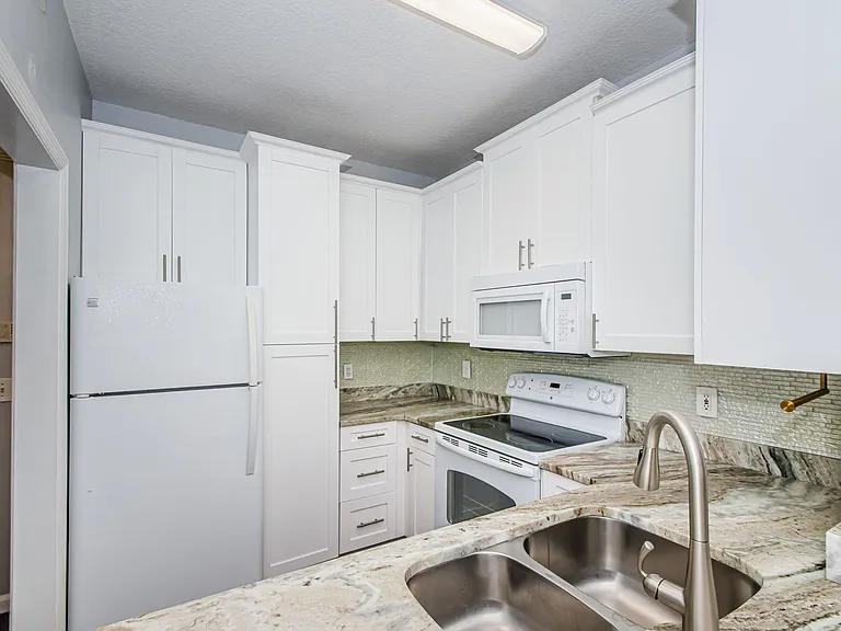 Updated Kitchen with Marble Countertops and newer appliances