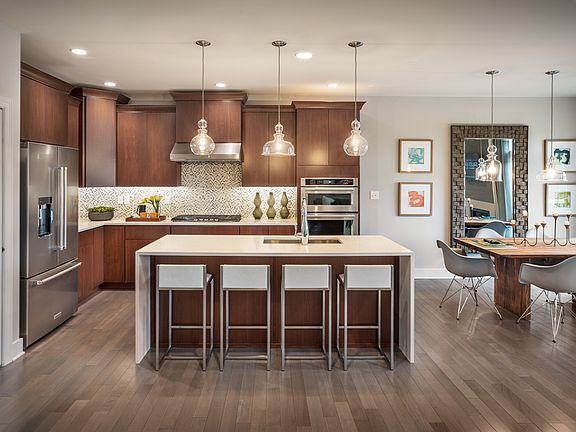 Well-Appointed Kitchen Opens to Dining Room