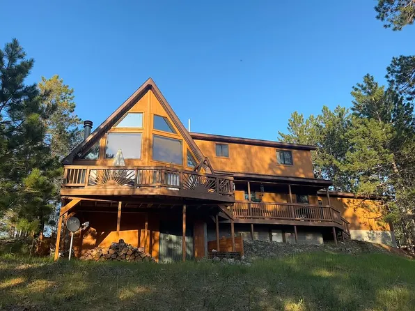 21426 Dowsett Trl, Atlanta, MI 49709