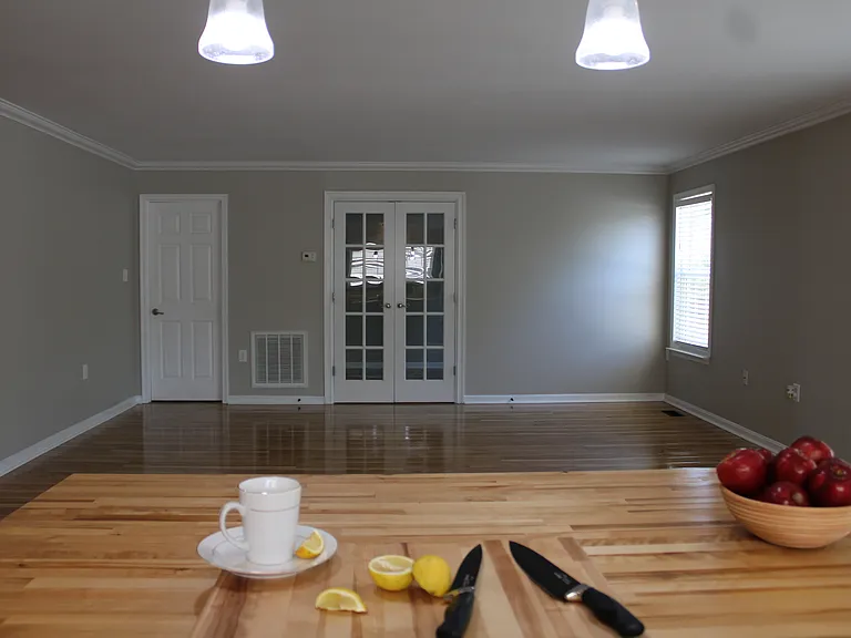 View from kitchen to family room and office area
