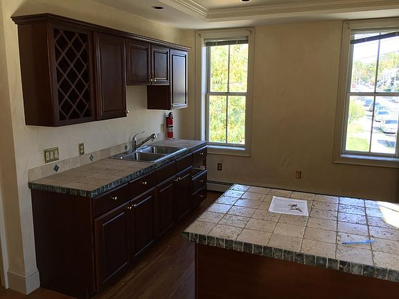 Illuminated with natural light by windows above your parking spot if you have parking privileges.