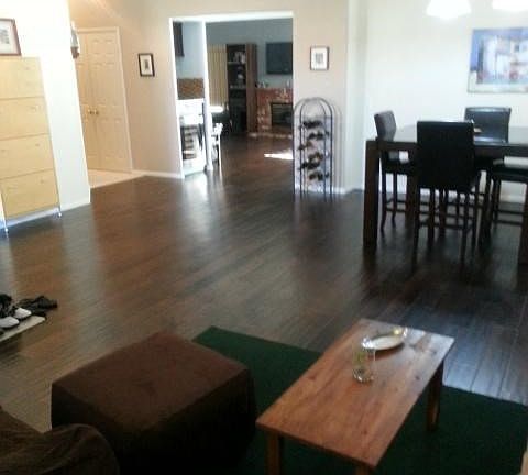 Hardwood flooring and open floor plan.