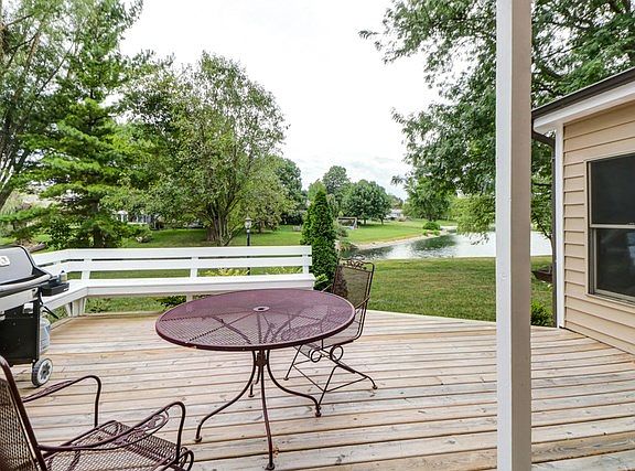 One of 2 decks over looking yard and lake