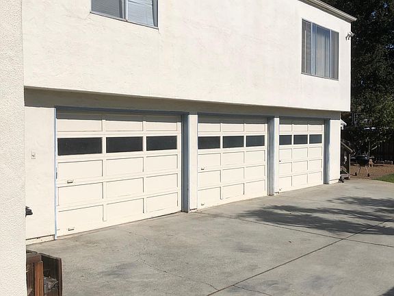 Garage Door for 615 is the Middle Door