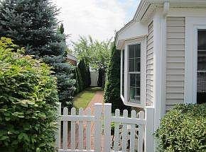 Picket fence & brick walkway