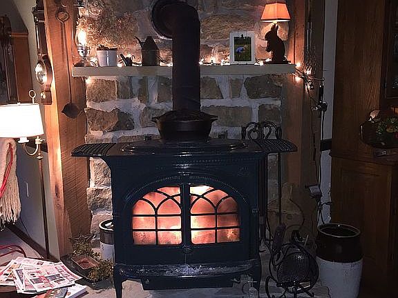 Wood stove heats main house.
