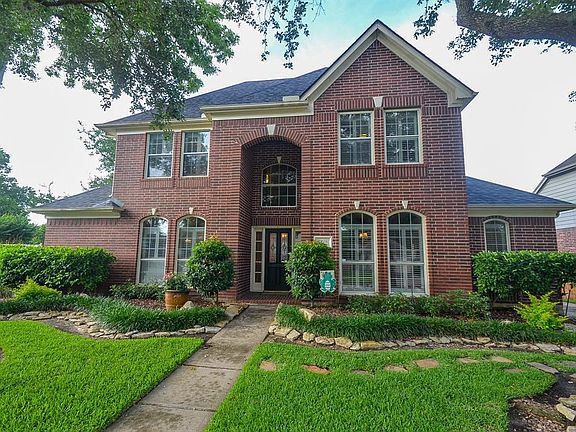 Beautiful home with curb appeal and large trees!