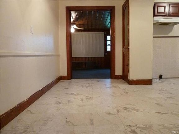 Breakfast room with access to the kitchen and family room.