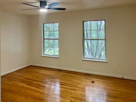 New ceiling fans and gleaming hardwood floors throughout!