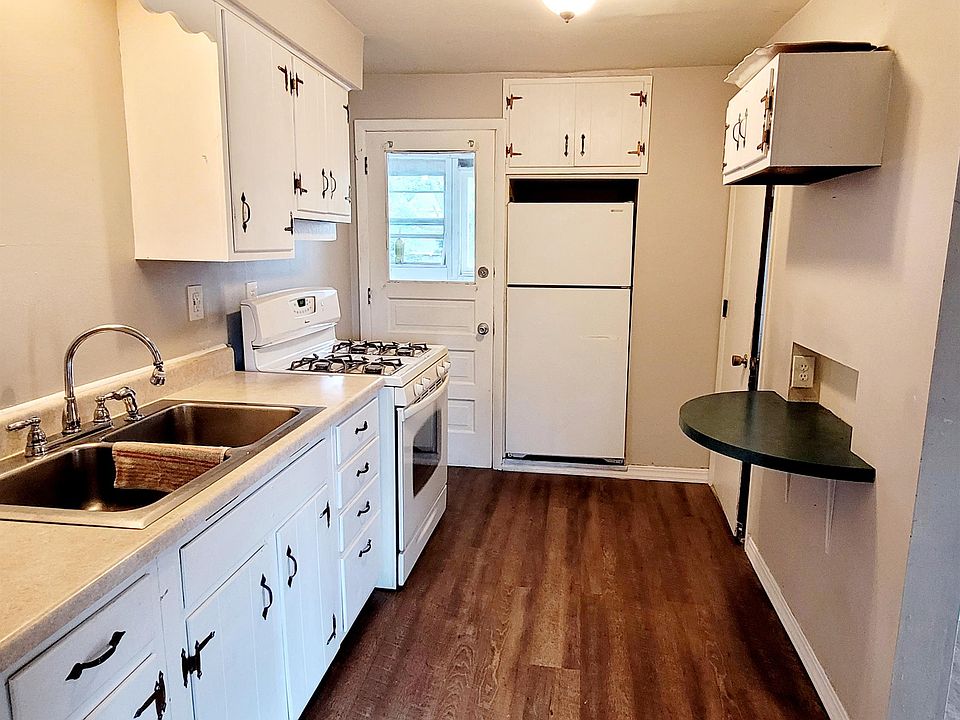 Kitchen w/ access to rear, storage area (shared space)