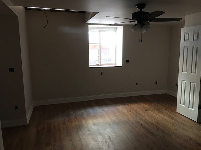 Egress window from lower level. This photo was taken prior to install of spiral staircase and electrical outlets