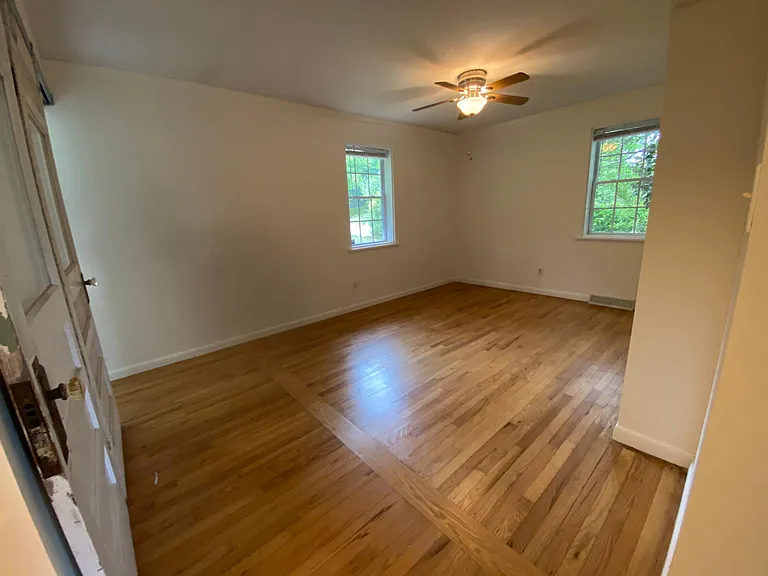 Master bedroom with walk in closet and full bath