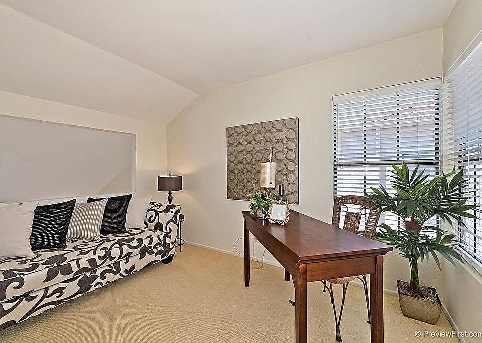 Second bedroom - opening overlooking the living room on the 