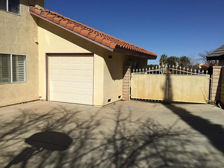 Side gate and through garage