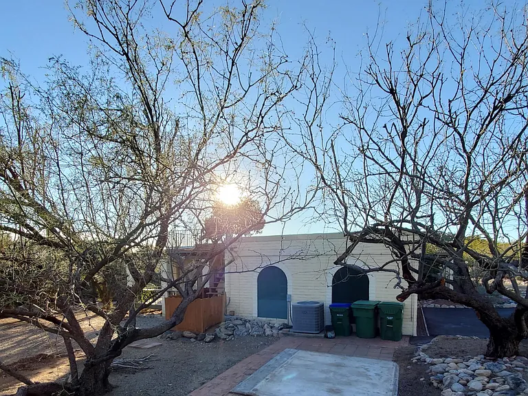 East view of the garage and stair to deck enclosure.