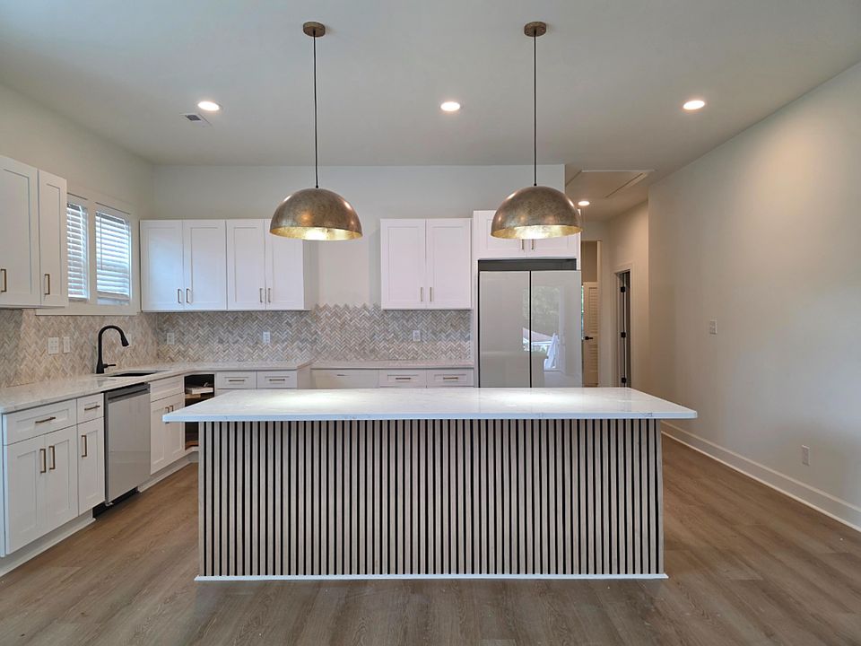 Island in the Kitchen (please note, the stove is not installed as of yet)