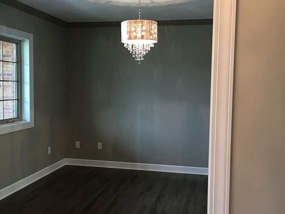 Den or dining room off foyer