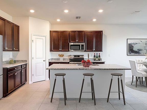 Sebring floorplan kitchen at BridgeWater by William Ryan Homes Tampa