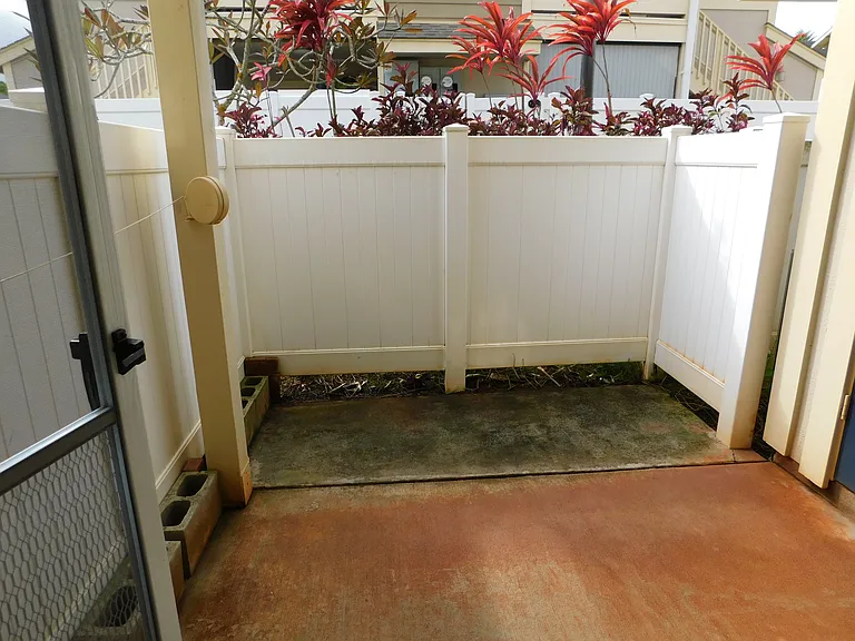 Kitchen opens to side courtyard.