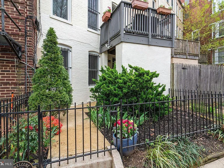 Private entrance at sidewalk level.