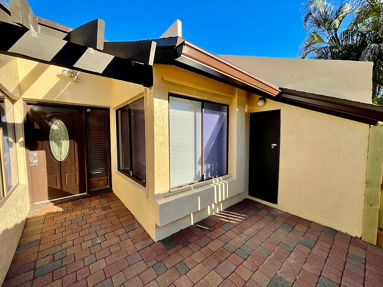 Front Yard with Storage Room
