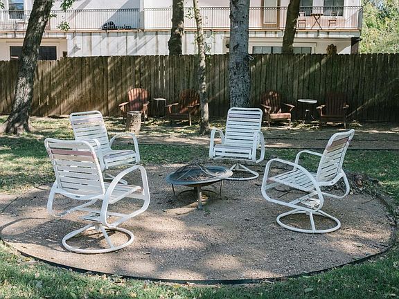 Back yard with fire pit and place to sit