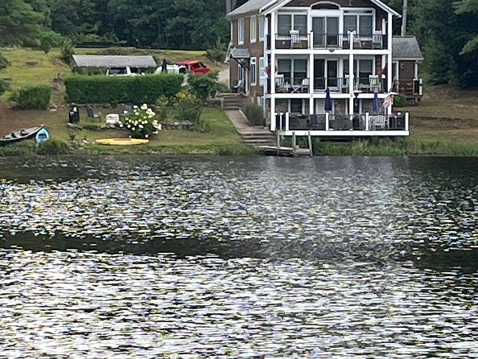 View of home from Lake and covered pavilion.