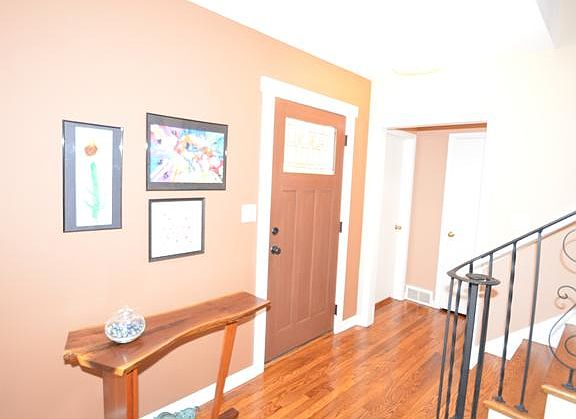 New Front Door and Updated Hardwood Floors