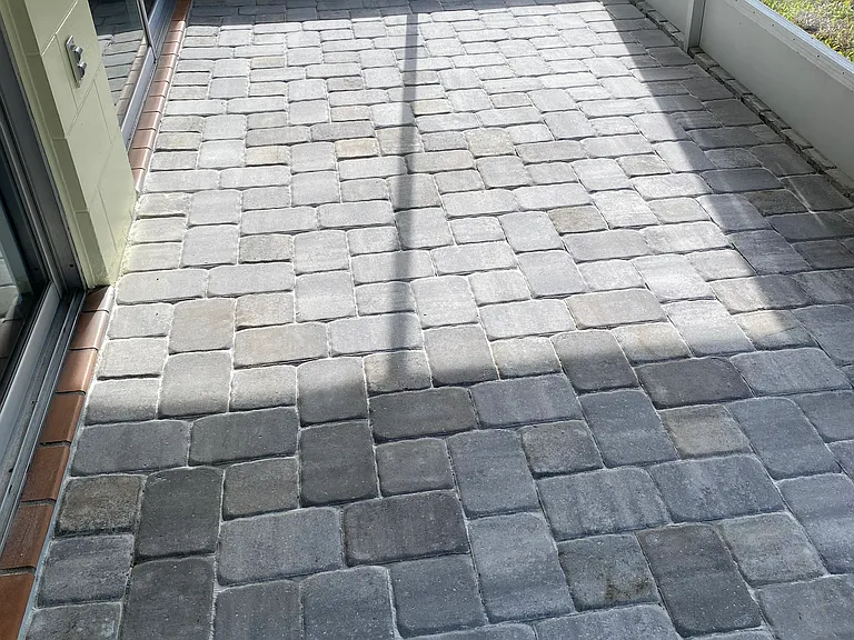 New pavers in the screened room.